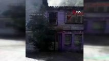 Fatih'te alev alev yanan binaya bahçe hortumuyla müdahale etti