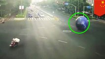 Massive moon rolls down the road, so man gives chase