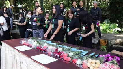 Heartbroken zoo staff lay flowers for panda who died in Thailand