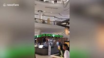 Dramatic moment shopping mall roof collapses during rain storm in Bangkok