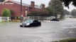 Cars and communities in Houston ravaged by high water from Tropical Depression Imelda