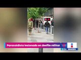 Paracaidista se lesiona al caer durante desfile militar | Noticias con Yuriria Sierra