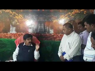 Minister R. Shankar, who warned the officer