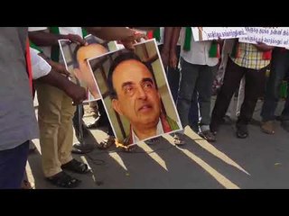 சுப்பிரமணிய சாமி படத்தை தீயிட்ட பொதுமக்கள்