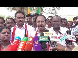 விஜயபாஸ்கர், வேட்பாளர் தம்பித்துரைக்கு இரட்டை இலை சின்னத்தில் வாக்குகள் சேகரித்தார்