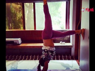 மேலாடை நழுவுவது கூட தெரியாமல் தலைகீழாக யோகா செய்த பிரபல நடிகை! வைரலாகும் வீடியோ