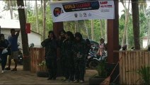 Indonesian army joins hundreds of locals for 