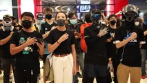 Hand on heart: Hong Kongers sing protest anthem in Yuen Long mall