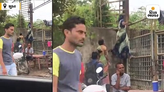 મહિલાઓ જીવના જોખમે 14 ફૂટ ઉંચી દીવાલ ચઢી રેલવે લાઈન પર જતી હોવાનો વીડિયો વાઈરલ