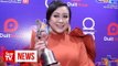 Suria FM's DJ Lin marks 20 years in radio industry bagging coveted award