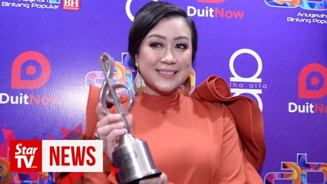 Suria FM's DJ Lin marks 20 years in radio industry bagging coveted award