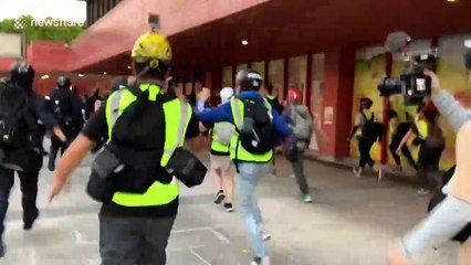 Hong Kong police storm shopping mall in Sha Tin