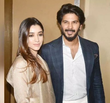 Dulquer Salmaan and his wifey Amal Sufiya attend the screening of 'The Zoya Factor'