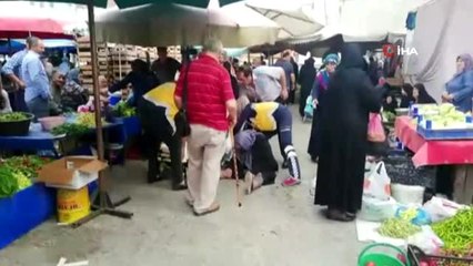 Pazarda çukuru fark edemeyen yaşlı kadın hastanelik oldu