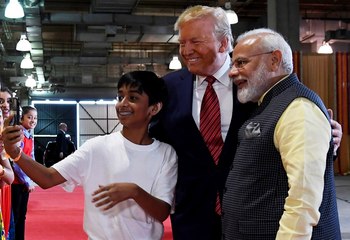 The boy who clicked a selfie with Modi and Trump