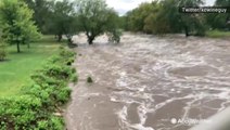 Flash flooding turns this creek into a raging rapid