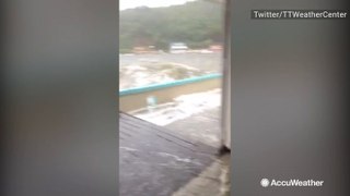 Tropical Depression Karen sends waves over porch