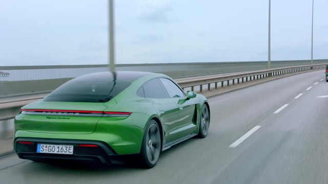 Porsche Taycan Turbo S in Mamba Green Metallic Driving in Hamburg & Kiel
