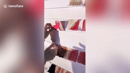 Artist creates incredible 'trick of the eye' paintings in Beijing