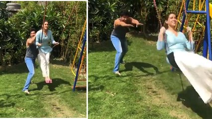 Sara Ali Khan enjoys swing ride with Varun Dhawan; Check Out Here | FilmiBeat