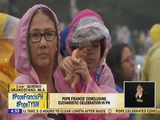 The Luneta crowd sings ""Tell The World Of His Love"" during the Candle Lighting and Mission Sending by the Pope
