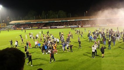 Crawley Town fans on the pitch