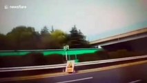 Female passenger terrified as motorist makes U-turn and drives wrong direction on busy Chinese highway