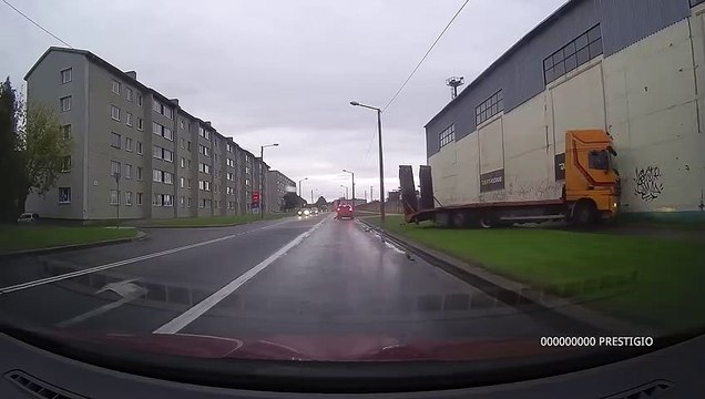 Truck Slides into Wall from Slippery Road