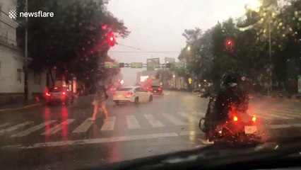 Strong storm causes heavy traffic in busy streets