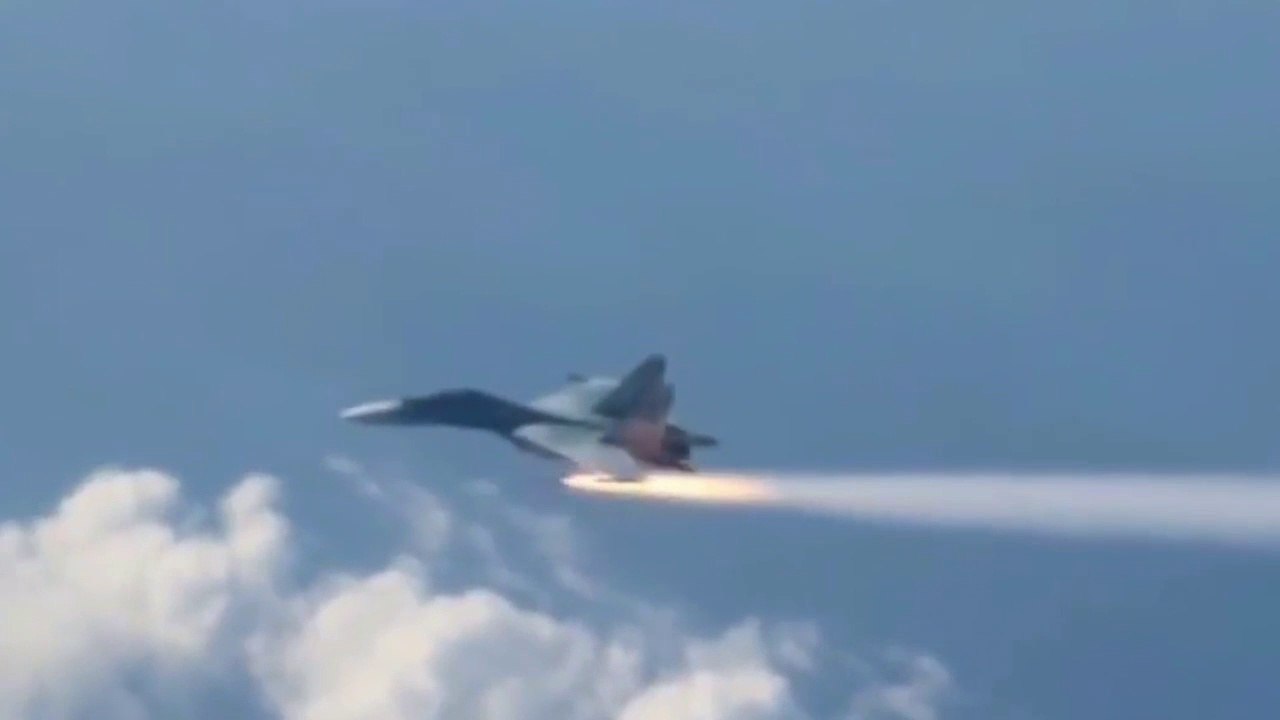 Sukhoi SU 34 launches air-to-air missiles