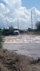 Truck Takes on Floodwaters