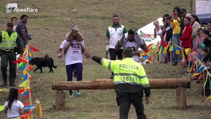 Colombia's first wife-carrying championship sees contestants navigate 700m course