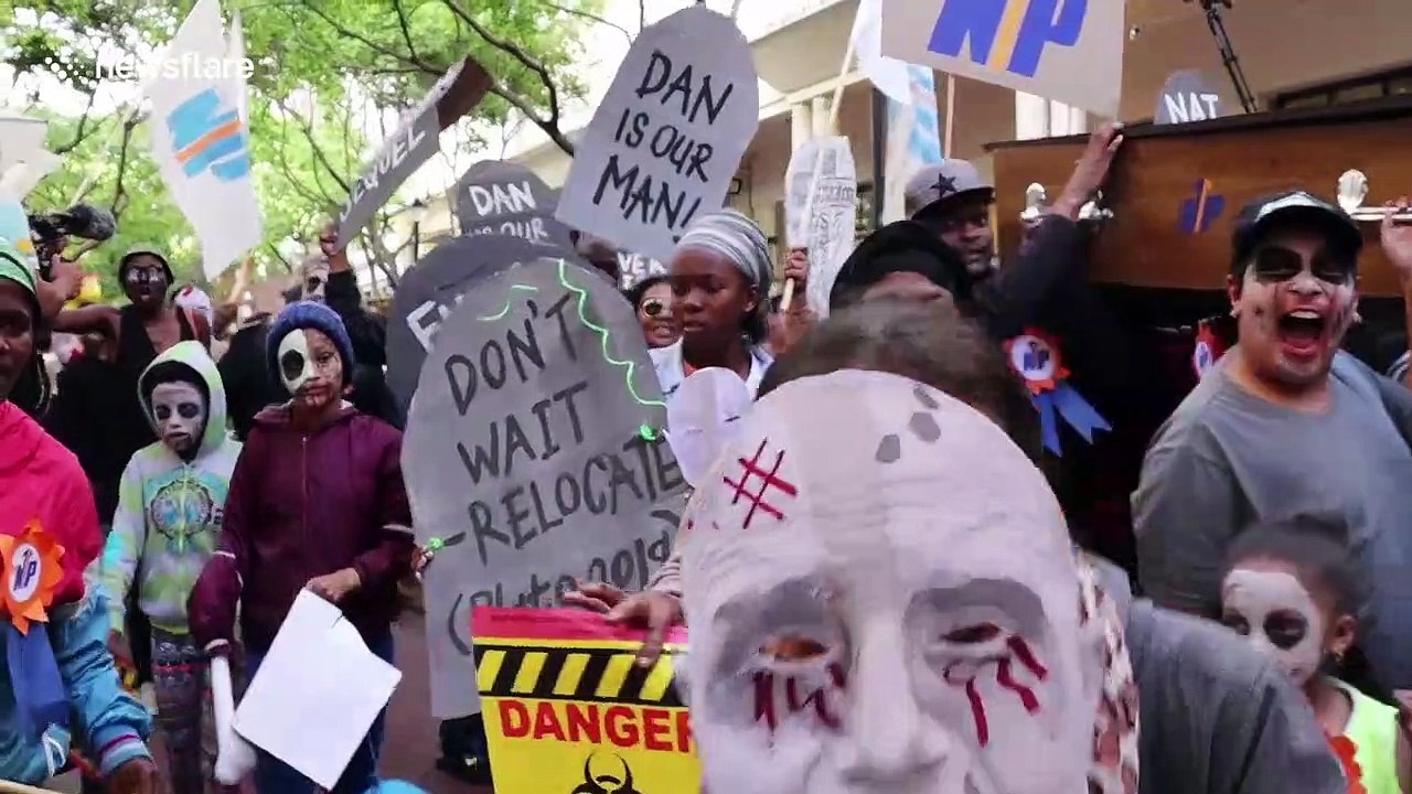 Activists dressed as zombies protest 'apartheid-style' housing policies in Cape Town