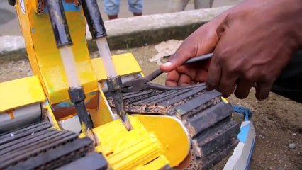 Displaced Cameroonian teen inspires with handmade toys
