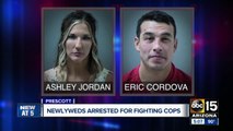 Newlyweds arrested for fighting officers