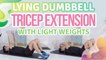 Lying dumbbell tricep extension with light weights - Step to Health