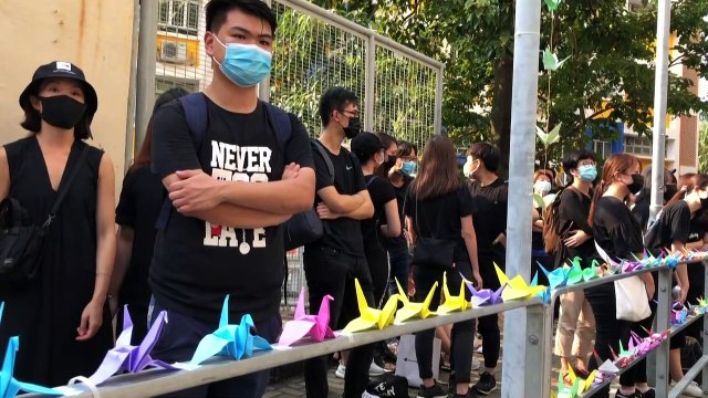 Sit-in at school of Hong Kong protester shot by police