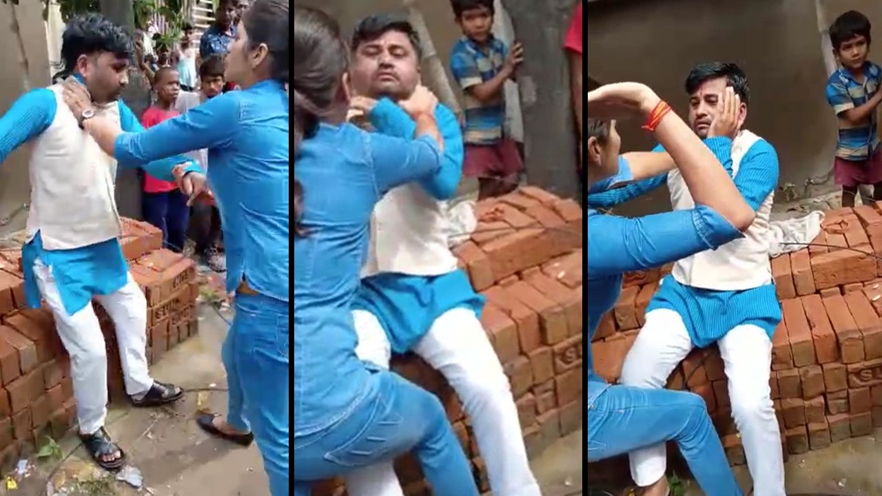 बीच सड़क पर शोहदे की लात-घूंसों से युवती ने जमकर की पिटाई, देखें वीडियो