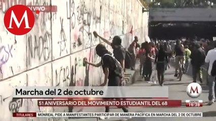 Encapuchados realizan pintas sobre de Eje Central