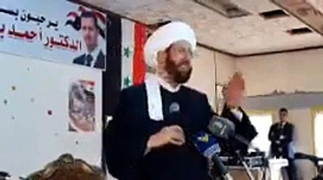 شاهد ترديد حسون عبارات طائفية أمام عناصر من ميليشيا حزب الله في القصير (فيديو)