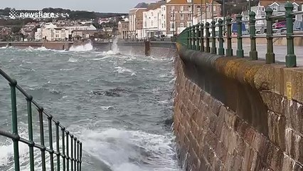 Waves crash against seawall in Cornwall as Hurricane Lorenzo reaches UK