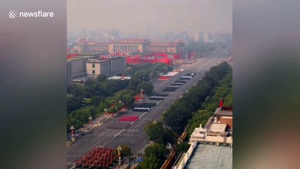 Impressive time-lapse footage shows thousands march down street during parade on China's National Day