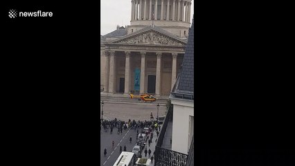 Paris knife attack: Crowd gathers to watch air ambulance depart in front of Pantheon