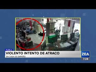 Niño se queda a en medio de un tiroteo registrado en una casa de empeño en Puebla