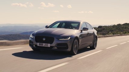 New Jaguar XE in Eiger grey Driving in Southern France