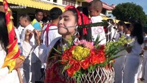 Devotees pierce their mouths with spikes at vegetarian festival in Thailand