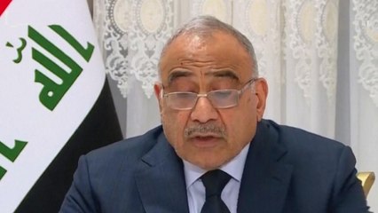 Iraq's PM calls for talks as thousands of protesters defy curfew