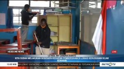 Bekas Kerusuhan Wamena, Aparat Keamanan dan Warga Bersihkan Pasar dan Sekolah