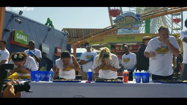 Competitors battle to eat as many tacos as possible in Santa Monica, California