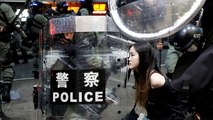 Arrests after police charge protesters in Hong Kong